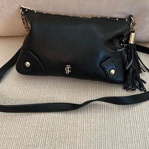 Leather small Juicy Couture crossbody purse.